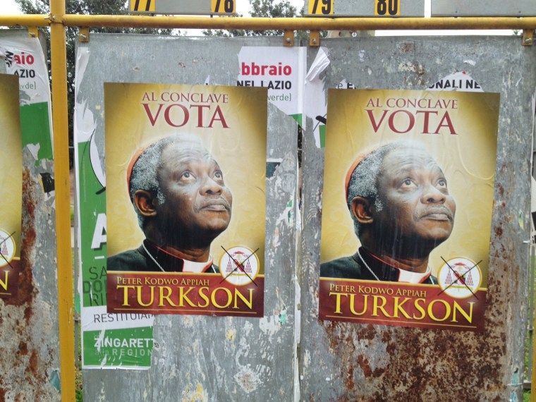 As cardinals prepare to choose who will be the next pope, posters seen on the streets of Rome appear to implore them to choose Ghanaian cardinal Peter Turkson.