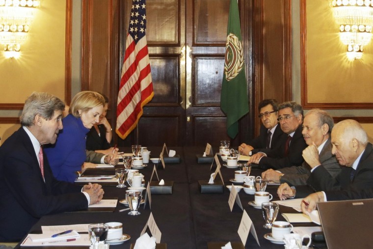 U.S. Secretary of State John Kerry, left, meets with Arab League Secretary General Nabil Elaraby, at far right, in Cairo, Egypt on Saturday, March 2, 2013.