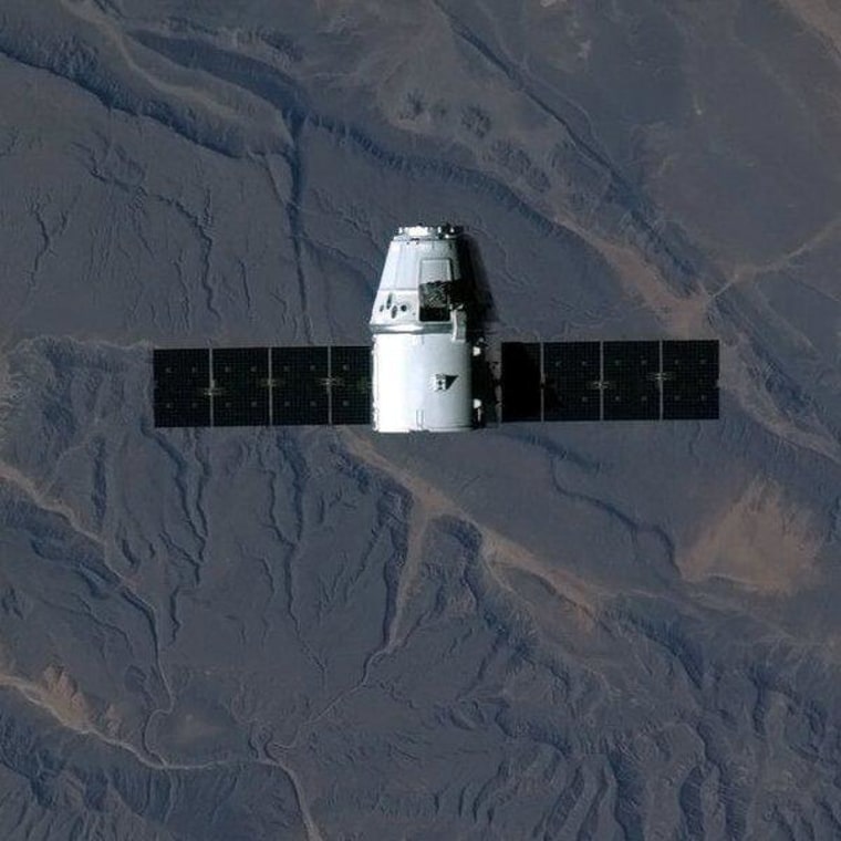 Sub-Saharan Africa provides a backdrop for SpaceX's Dragon capsule in a photo taken from the International Space Station during the cargo ship's approach.