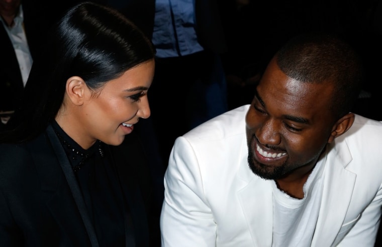 Kim Kardashian and Kanye West attend the Givenchy Fall/Winter 2013 Ready-to-Wear show as part of Paris Fashion Week on March 3 in Paris.