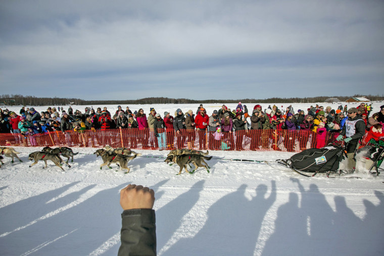 Peter Kaiser's team charges down the trail during the start on March 3.