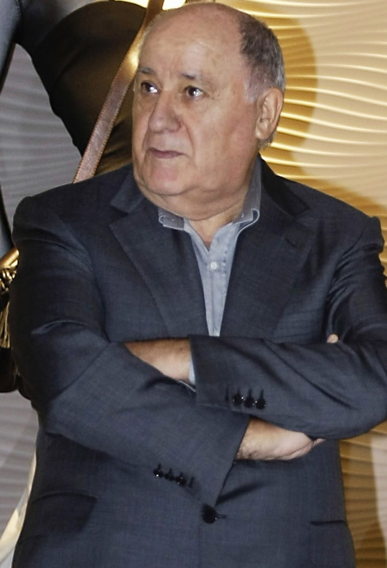 Chairman of Spanish global fashion giant Inditex, Amancio Ortega stands during a visit to an Inditex factory in Coruna, northern Spain in this file ph...