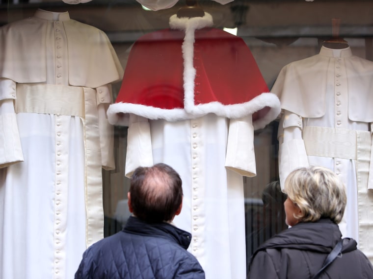 Garments for the next pope are displayed at the Gammarelli Atelier in Rome.