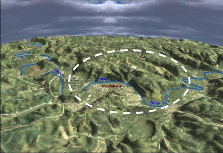 A three-dimensional view of Decorah, Iowa, and the Upper Iowa River with the location of the Decorah Impact Structure marked with the white dotted line. Scene is looking due north.