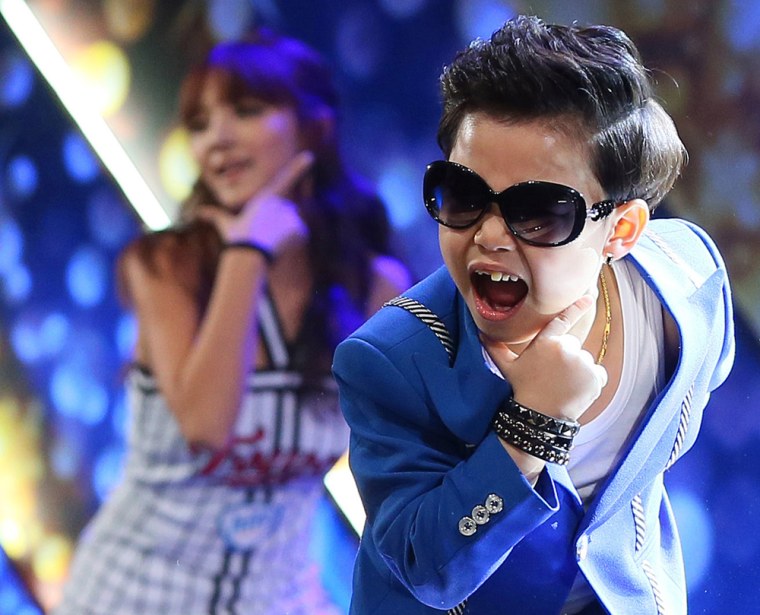 South Korean Hwang Min-woo, the 7-year-old nicknamed \"Little PSY,\" performs during a concert in Seoul, South Korea, in December.