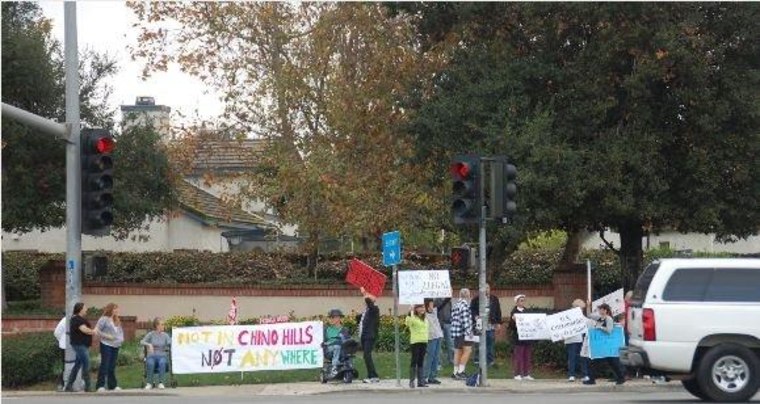 Angry neighbors picketed outside a Chino Hills, California, maternity hotel in December