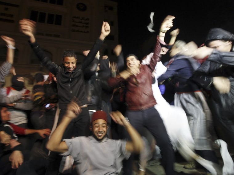 Activists and demonstrators against Egyptian President Mohamed Mursi perform a new dance craze, the \"Harlem Shake\", in front of the Muslim Brotherhood...