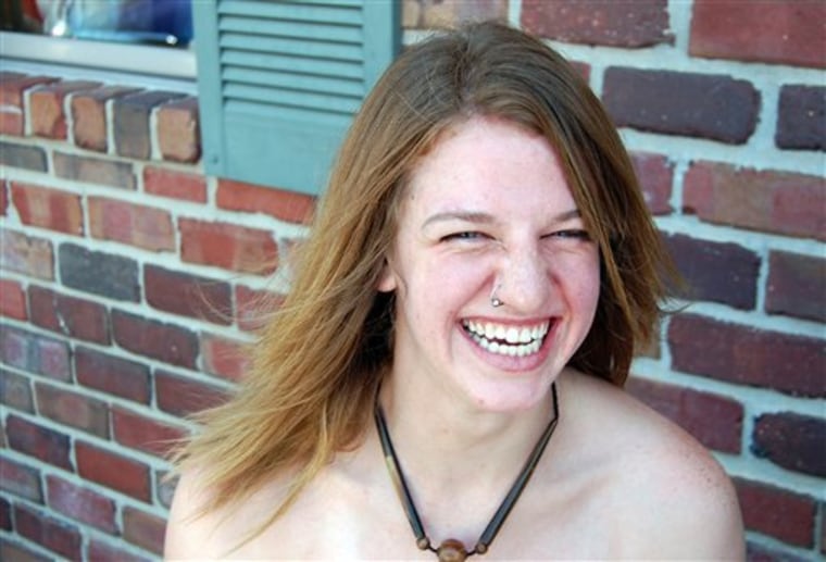 This undated photo provided by Paul Hanson shows his sister, Dianna Hanson, a 24-year-old intern at the Cat Haven in Dunlap, Calif., who was mauled to death by a lion .