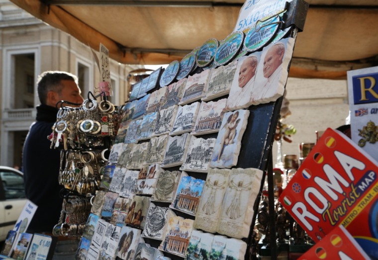 Souvenirs are displayed at a stand in Vatican City on March 9.