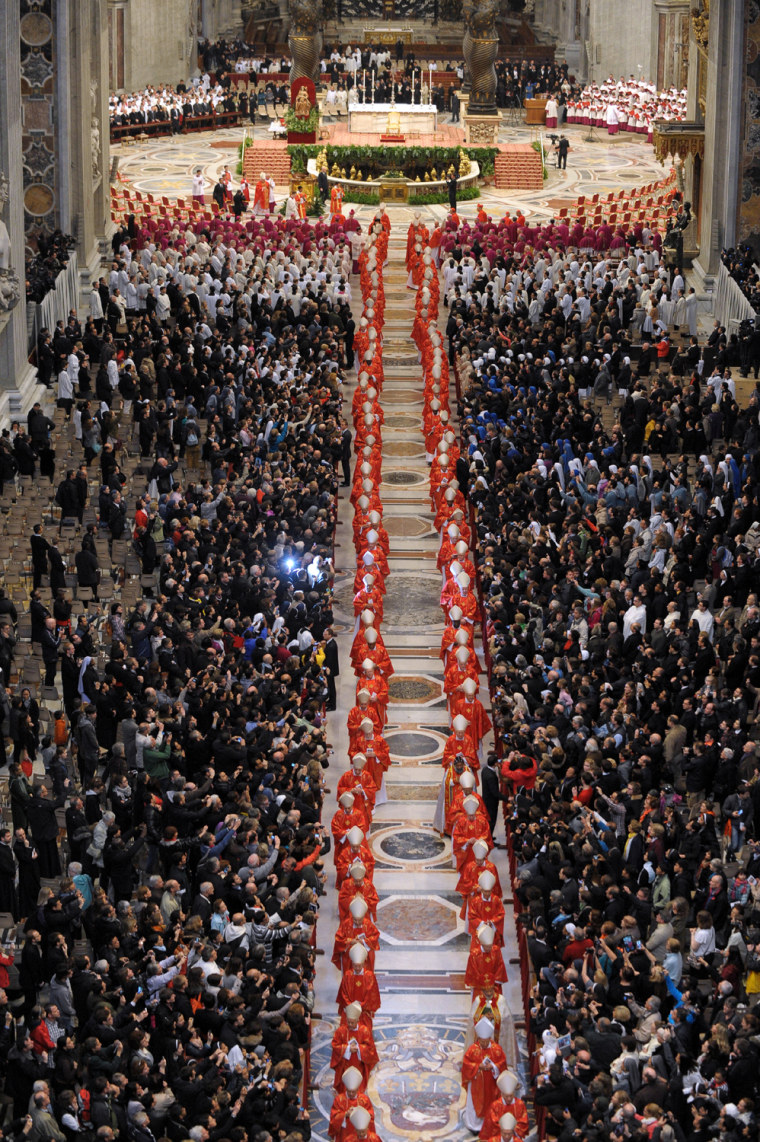 In this photo provided by the Vatican newspaper L'Osservatore Romano, cardinals, in red, and faithful attend a Mass for the election of a new pope celebrated by Cardinal Angelo Sodano inside St. Peter's Basilica, at the Vatican, Tuesday, March 12. Cardinals enter the Sistine Chapel on Tuesday to elect the next pope amid more upheaval and uncertainty than the Catholic Church has seen in decades: There's no front-runner, no indication how long voting will last and no sense that a single man has what it takes to fix the many problems.