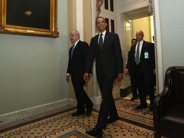 President Barack Obama departs the Capitol after meeting with Senate Democrats in Washington March 12, 2013.