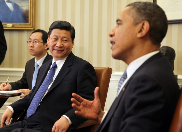 epa03105910 US President Barack Obama (right) meets with Vice President Xi Jinping of the People's Republic of China in the Oval Office of the White ...