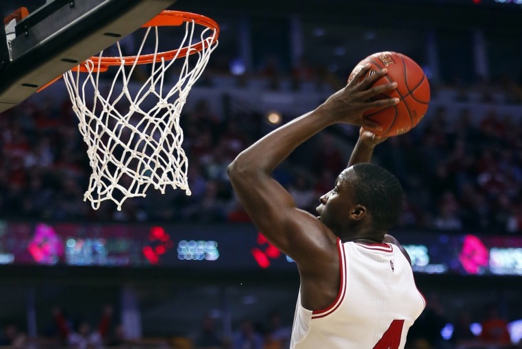 Indiana Hoosiers guard Victor Oladipo (4) goes in for a dunk against the Illinois Fighting Illini during the second half of their NCAA men's college b...