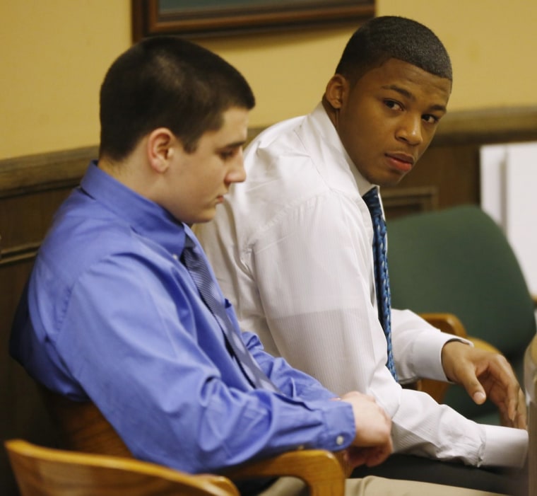 Trent Mays, left, and Ma'lik Richmond sit in juvenile court in Steubenville, Ohio, on Friday.