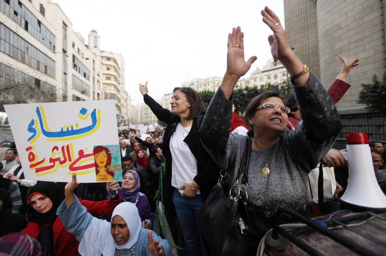 Women shout slogans against Egyptian President Mohamed Mursi and members of the Muslim Brotherhood during a protest rally near Tahrir Square in Cairo on March 8, 2013.