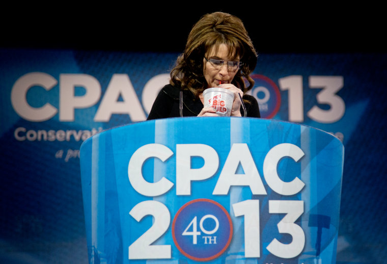 Former Alaska Gov. Sarah Palin drinks from a 7-Eleven Super Big Gulp on stage while speaking at the 40th annual Conservative Political Action Conference in National Harbor, Md., on Saturday. Earlier in the week a New York judge struck down a ban proposed by New York Mayor Michael Bloomberg to end the sale of sugared sodas larger than 16 oz.