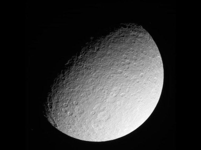 This raw image of Saturn's icy moon Rhea was taken on March 10, 2013 by NASA's Cassini spacecraft. The camera was pointing toward Rhea at approximately 174,181 miles away.
