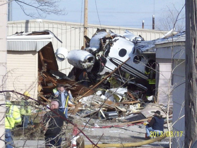 The small twin-jet aircraft crashed into houses near the South Bend Regional Airport.