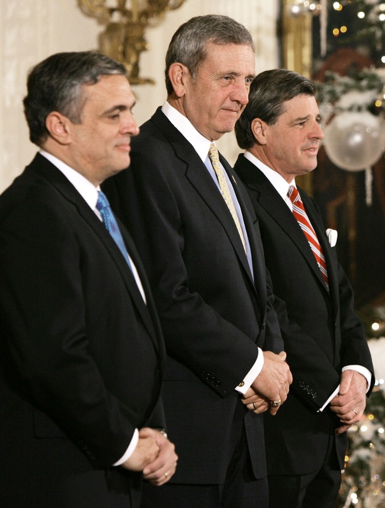 Presidential Medal of Freedom recipients, from left former CIA director George Tenet, retired four star General Tommy Franks, and Paul Bremer, former administrator of the Coalition Provisional Authority in Iraq, attend the awards ceremony in the East Room of the White House on Dec. 14, 2004.