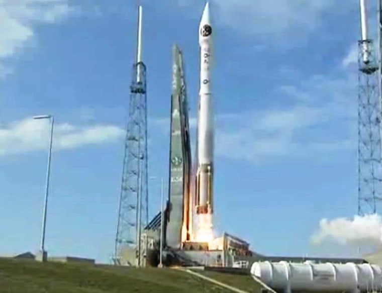 An Atlas 5 rocket lifts off from Cape Canaveral Air Force Station in Florida, carrying a Space-Based Infrared System satellite, or SBIRS GEO-2, into orbit.