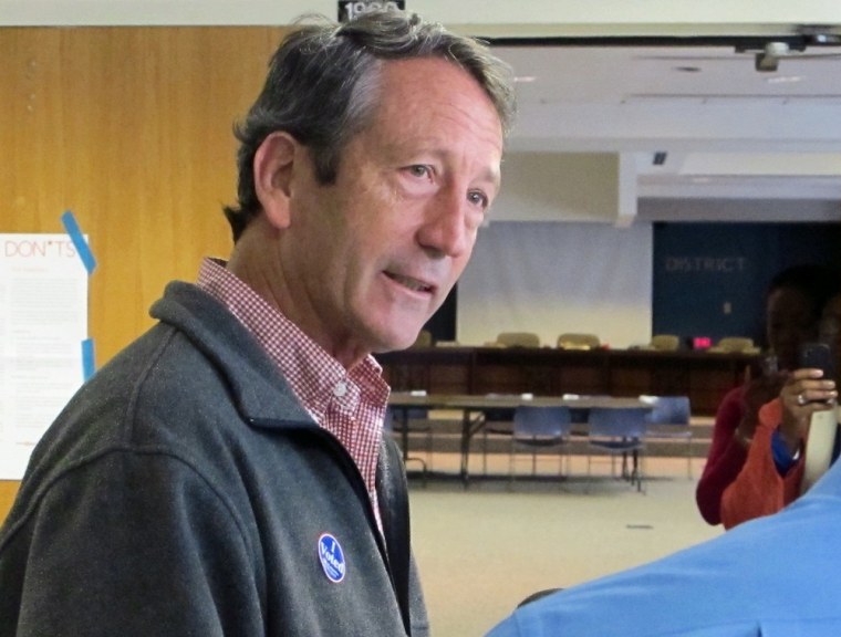 Former South Carolina Gov. Mark Sanford speaks with reporters on Tuesday, March 19, 2013, at a polling place in Charleston, S.C.