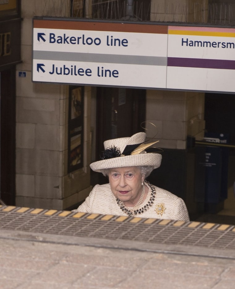 Queen Elizabeth is shown leaving after an official visit to Baker Street Underground Station.