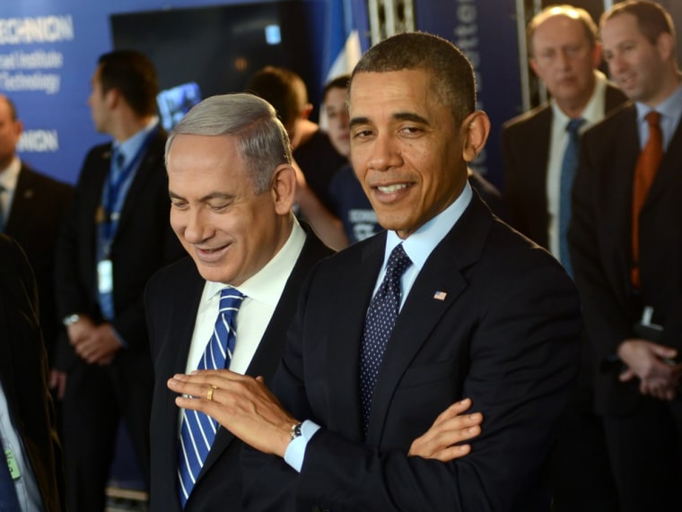 President Barack Obama and Israeli Prime Minister Benjamin Netanyahu view a robotic snake used in search and rescue at an Israeli technology exhibition in the Israel Museum on March 21, 2013 in Jerusalem, Israel.