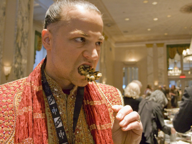 Baron Ambrosia shows us how to snack on fried tarantula.