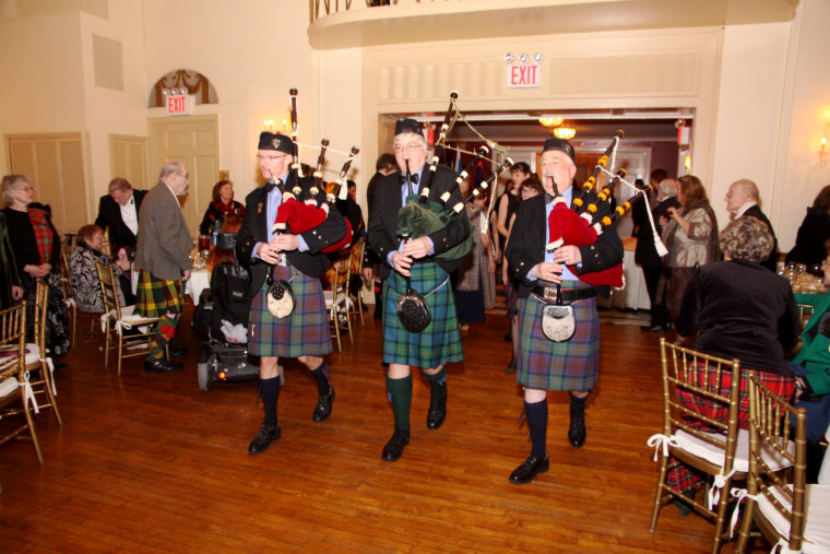 Pipers from New York Scottish Pipes and Drums pipe dignitaries into the New York Caledonian Club's Burns Night held Saturday.