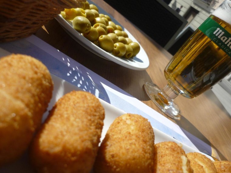 Cod fish and potato croquettes and beer.  Madrid.