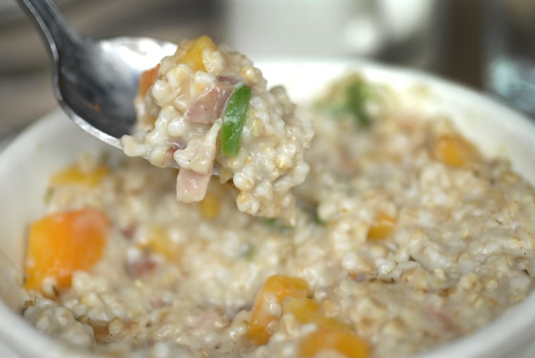 Close-up shot of the butternut squash oatmeal with chilies and smoked bacon from The Farm on Adderley in Brooklyn, NY.