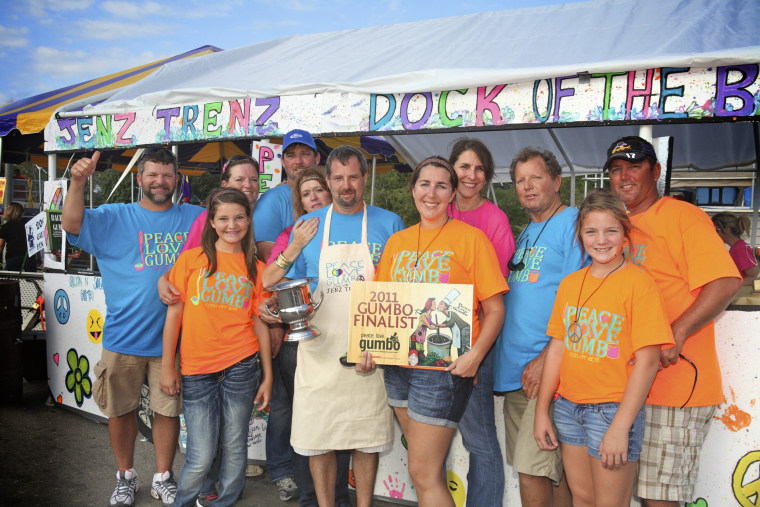 The winners of this year's World Championship Gumbo Cook Off pose with their trophy.