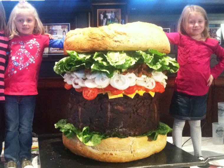 Kids post with the 3-foot tall burger