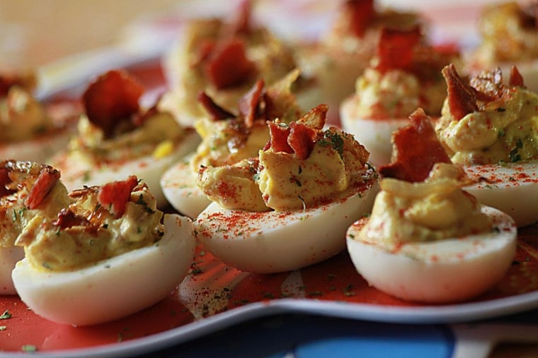 Smoked Turkey Bacon Deviled Eggs topped with Caramelized Onion and a dusting of Paprika; was this Easter's appetizer when guests arrived. Tasty! (prepared and photographed by me).