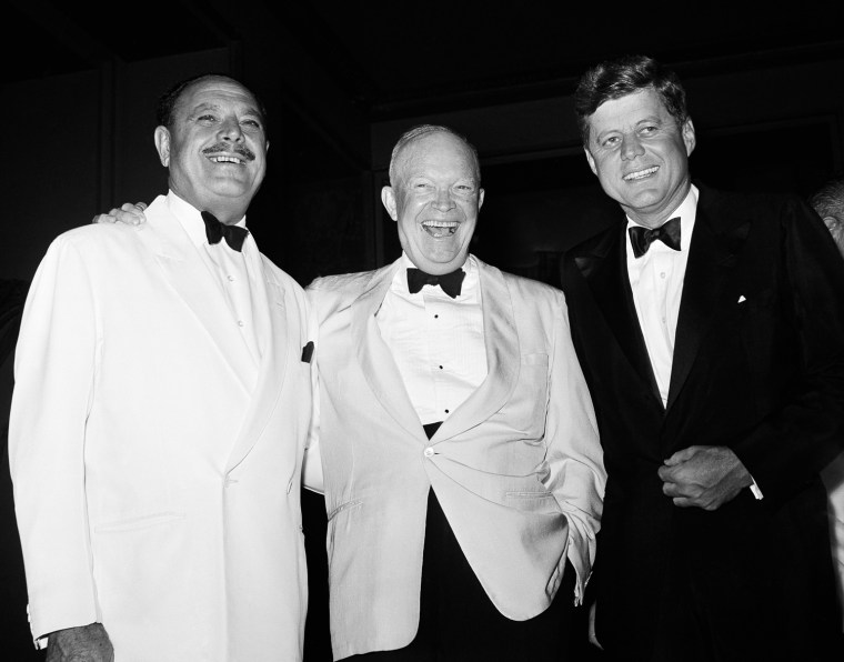 Pakistan's president poses with President Kennedy before a state dinner given at Washington, D.C. July 13, 1961. President Khan honored President and and Mrs. Kennedy at this dinner.