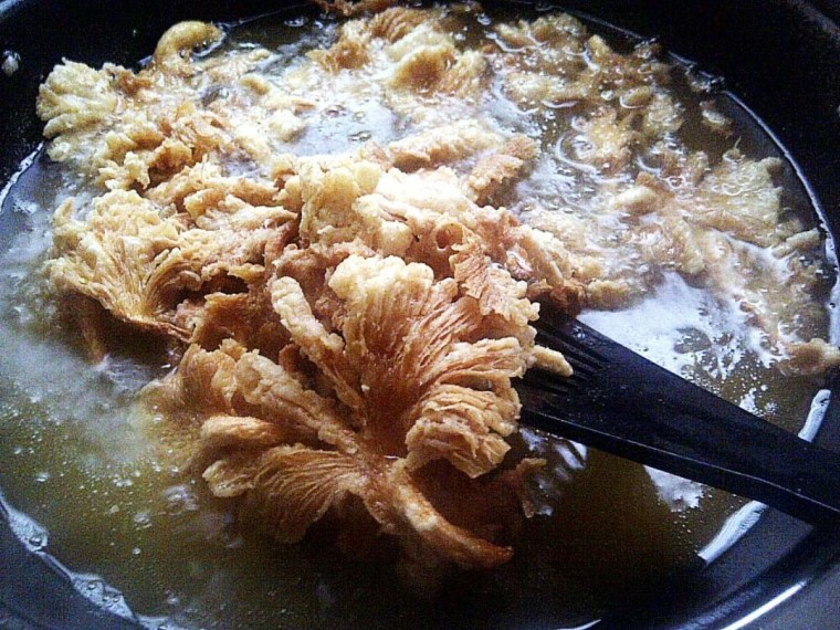 Very famous fried oyster mushroom,jamur kriuk eyang; in English it means \"grandma crunchy mushroom\"