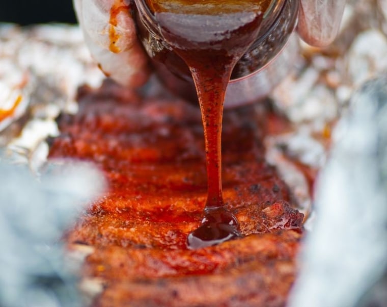 This was taken at Smoking In barbecue cook-off in McMinnville, Tenn. He smoked the ribs for 6 hours. He let me try them before submitting to the judges. They were mouthwatering, falling off the bone, cooked perfectly. Some of the best ribs I have ever tasted.