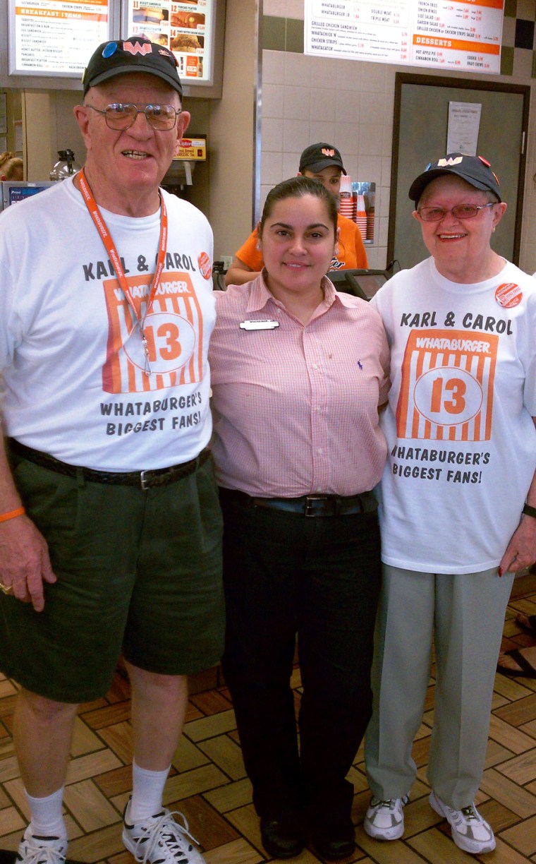 Karl and Carol Hoepfner are pictured with a Whataburger employee.