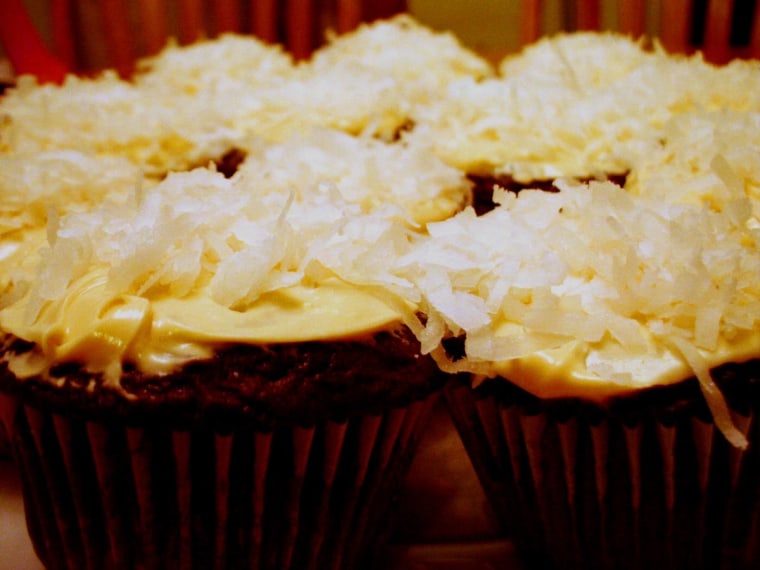 Extremely chocolate, slightly mango cupcakes with coconut icing.