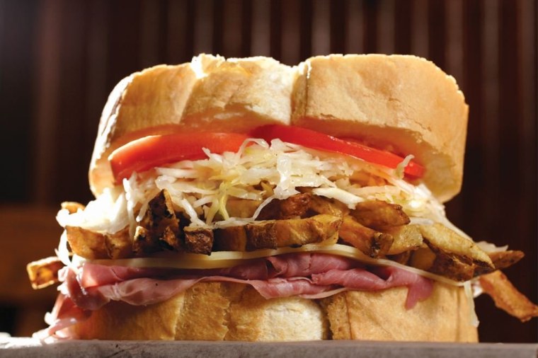 Try a turkey and fries sandwich from Pittburgh eatery Primanti Bros.