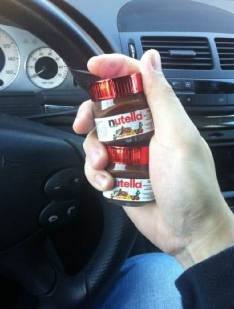 Fabio REALLY loves Nutella. He sent us this shot of himself in his car.