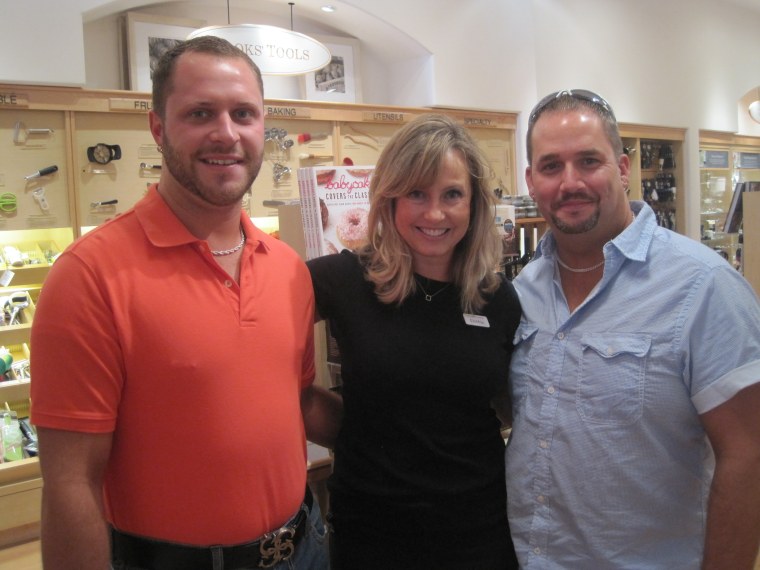 Debbie Boroughs poses with two friends at a cake tasting she held at Williams-Sonoma.