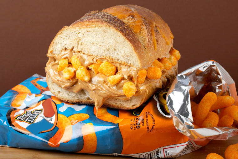 The Cheese Puff sandwich features Italian cheddar bread with creamy peanut butter and Cheetos® cheese puffs.
