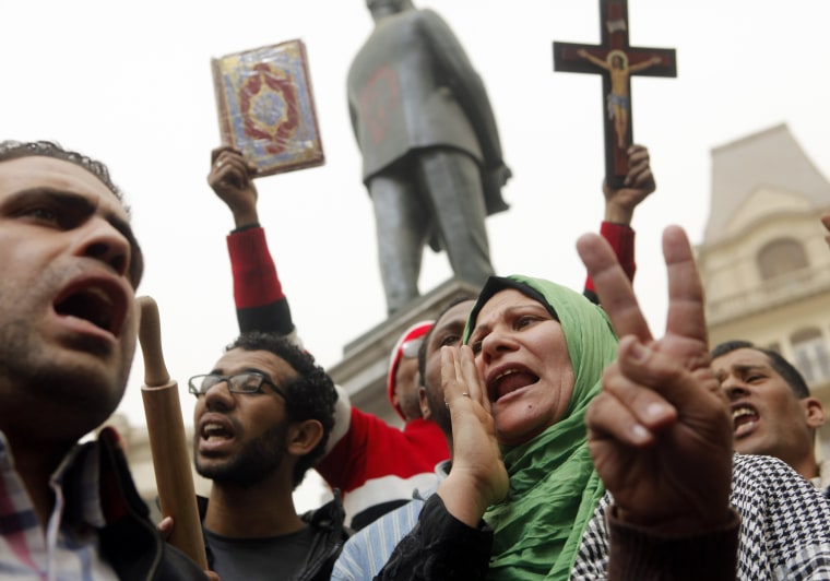 Egyptians shout anti-Muslim Brotherhood slogans during a demonstration, in Talaat Harb Square in downtown Cairo, Egypt, on March 22, 2013.