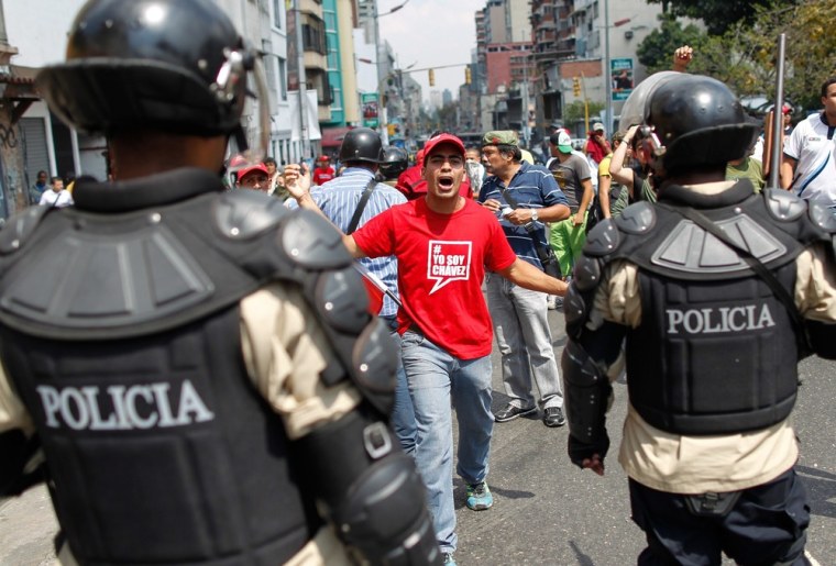 Supporters of Hugo Chavez march in Caracas on Thursday.