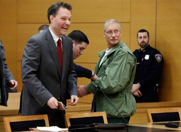 David Ranta, right, with his attorney Pierre Sussman, has his handcuffs removed after Judge Miriam Cyrulnik freed him, in state Supreme Court in Brooklyn, New York, on March 21.