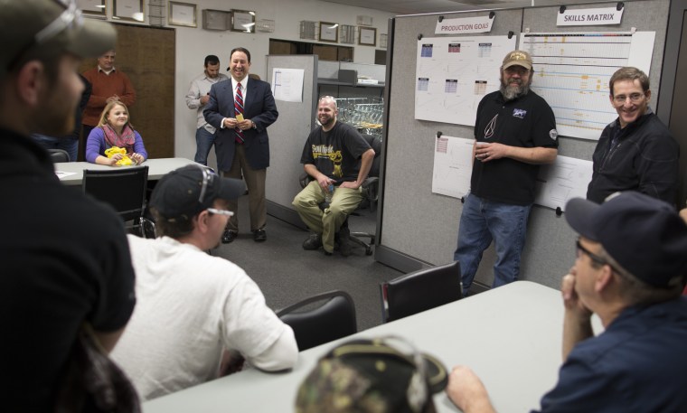 Thursday, Jan. 31, 2013, in Baltimore, MD (John Makely / NBC News) Drew Greenblatt (in tie) , CEO of Marlin Steel Wire , says his seeing a pickup in...