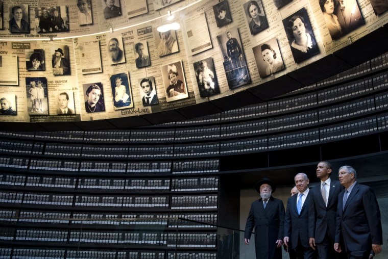 Obama tours the Hall of Names at the Yad Vashem Holocaust Museum in Jerusalem, alongside Avner Shalev (right), Chairman of the Yad Vashem Directorate, and Israeli Prime Minister Benjamin Netanyahu.