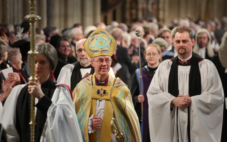 Archbishop of Canterbury Justin Welby, second left, during his enthronement service at Canterbury Cathedral in Kent, England, on March 21, 2013.