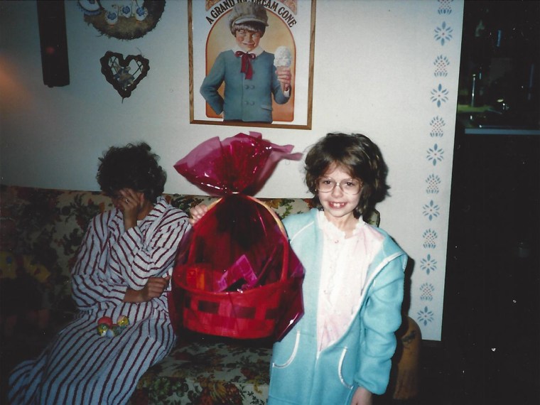 An elated 8-year-old Dylan with her Easter basket in 1990.